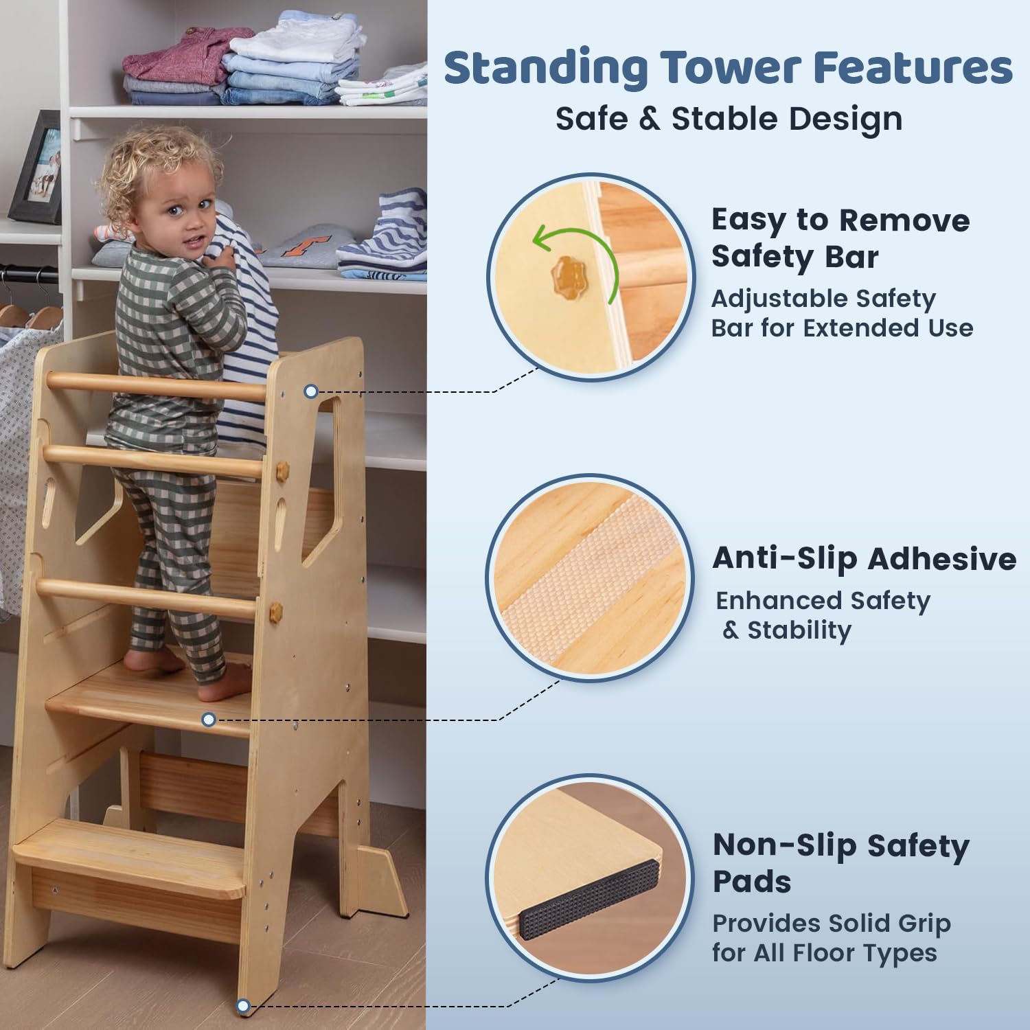Toddler standing on natural wood learning tower with anti-slip strips and removable knob-screw safety bar