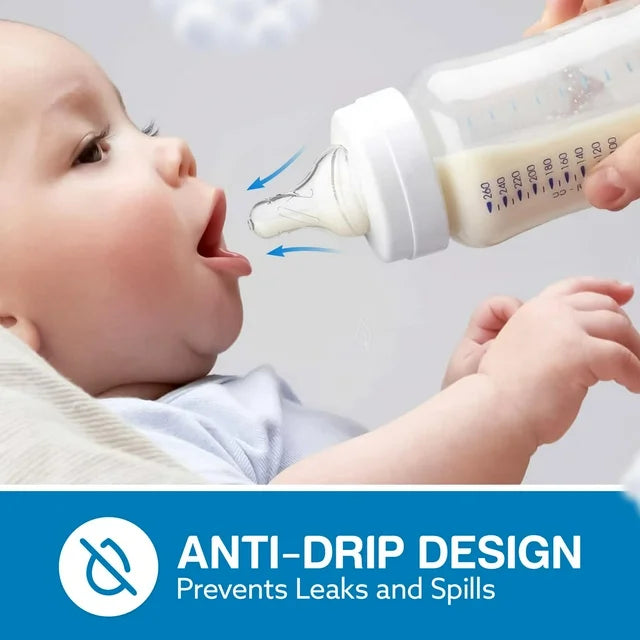 Baby drinking from bottle with anti-drip SkinSoft Silicone Nipple, blue arrows highlighting leak-proof seal