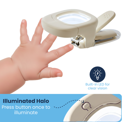 Baby nail clipper with built-in LED illuminated halo trimming a toddler's tiny fingernail