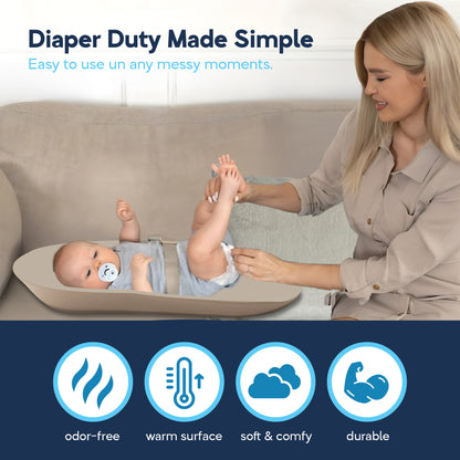 Mom changing baby's diaper on beige EVA foam pad atop sofa, odor-free warm surface icons below