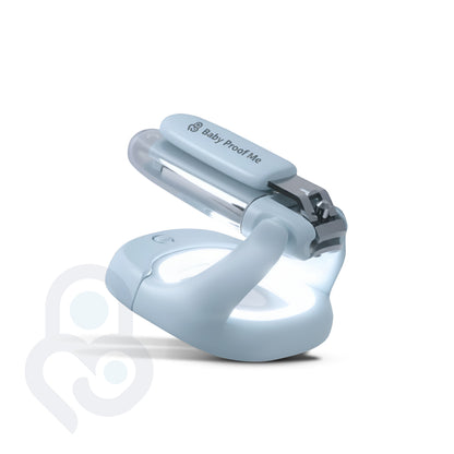 Blue baby nail clipper with built-in LED magnifier base and stainless steel blade, lid open
