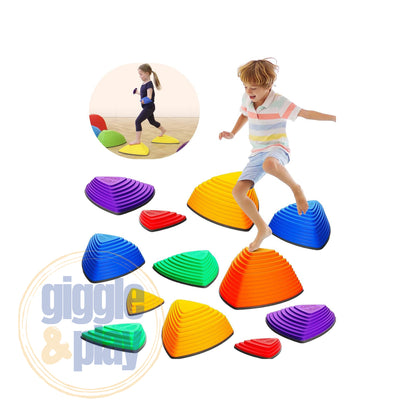 Child leaping across 12-piece rainbow stepping stones set, various sizes arranged as balance course