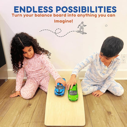 Two kids in pajamas rolling toy cars across a flat wooden balance board on a hardwood floor