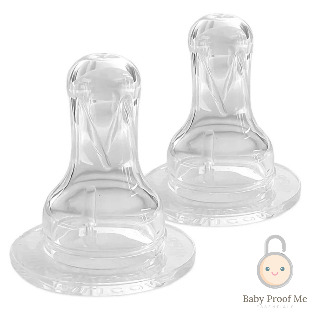 2 clear SkinSoft Silicone Nipples side by side, wide flat base and domed tip visible, Baby Proof Me logo